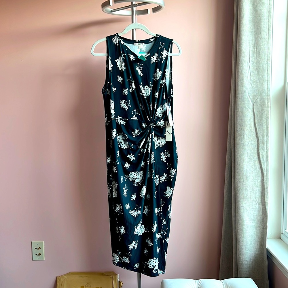 Dress, XXL, completely new. The color is teal green with flowers.